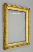 A large Victorian gilt picture frame. 80 x 106 cm.