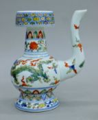 A Chinese doucai porcelain teapot. 20.5 cm high.