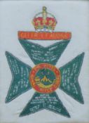 A World War II prisoner of war embroidery of the King's Royal Rifle Corps insignia with battle