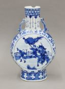 A 19th century Chinese blue and white porcelain moon flask. 30 cm high.