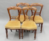 A set of four Victorian mahogany dining chairs. Each 46 cm wide.