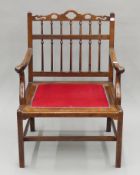 An 18th century Anglo-Dutch mahogany hall chair. 60 cm wide.