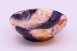 A small blue john bowl. 5 cm diameter.
