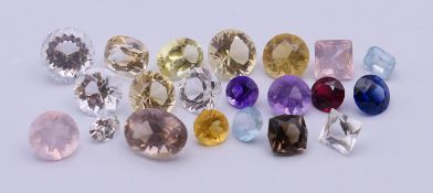 A collection of various gemstones. The largest 2 cm long.