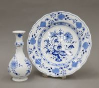 A Meissen blue and white porcelain vase and dish. The former 18 cm high.