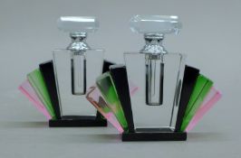 A pair of fan-form glass scent bottles. Each 8 cm high.