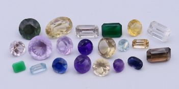 A collection of various gemstones. The largest 2 cm long.