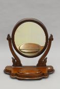 A Victorian mahogany toilet mirror. 64 cm wide.