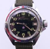 A vintage Russian Kauahguyckue gentlemen's wristwatch. 4.2 cm wide including crown.