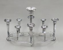 A large silver-plated centre piece. 50 cm long.