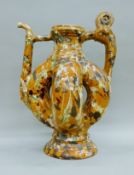 An early Turkish pottery jug. 43 cm high.