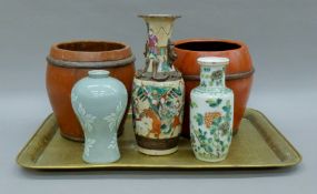 Two Chinese vases, a Japanese vase, two rice buckets and a Persian brass tray.