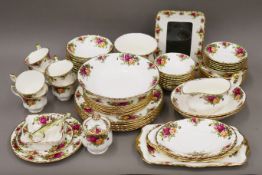 A quantity of Royal Albert Old Country Roses porcelain. The vase 12 cm high.