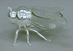 A silverplate-mounted bee-form honey pot. 15 cm long.