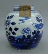 A Chinese blue and white tea jar. 24 cm high.