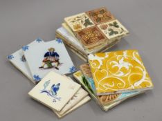 A quantity of Victorian and later decorative ceramic tiles including some moulded.