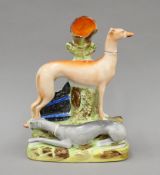 A Victorian Staffordshire porcelain Daphne and Apollo spill vase. 27 cm high.