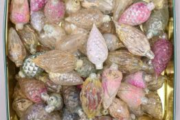 A collection of early 20th century glass Christmas tree fairy lights of various sizes.