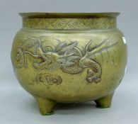 A large Japanese bronze censer decorated with dragons. 26.5 cm diameter.