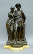 A patinated bronze Classical group mounted on a marble plinth base. 54 cm high.