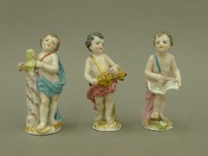 Three 19th century Continental porcelain figures. The largest 10.5 cm high.