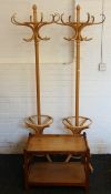 Two bentwood hat stands and a two-tier side table. The former each 195 cm high.