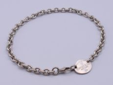 A Tiffany & Co silver pendant necklace. 38 cm long.
