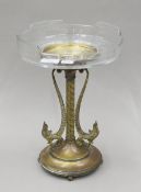 A glass-topped brass centrepiece. 33 cm high.