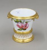 A 19th century painted porcelain vase on stand. 15.5 cm high.
