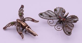 Two filigree insects. The butterfly 8 cm wide.