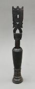 A Papua New Guinean carved wooden pestle and mortar. The mortar 17.5 cm high.