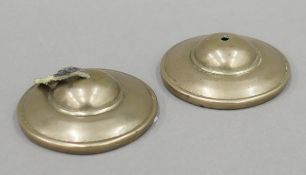 A pair of Tibetan bronze prayer cymbals (tingsha). Each 8 cm diameter.
