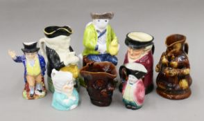 A quantity of 19th century and later Toby jugs, including some treacle-glazed.