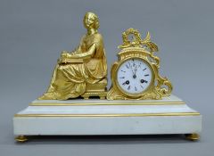 A 19th century gilt bronze-mounted marble mantle clock. 43.5 cm wide.