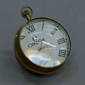 A ball clock. 8 cm high.