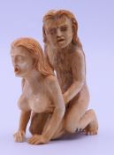 An erotic bone netsuke carving. 7 cm high.