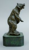 A bronze bear on a marble plinth base. 17.5 cm high.
