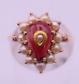 A 9 ct gold seed pearl set ring. Ring size O. 4.6 grammes total weight.