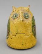 A mid century pottery owl-form box, with stamped mark. 13 cm high.