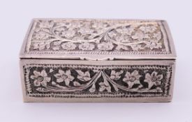 An unmarked Eastern silver snuff/trinket box. 5.5 x 3.5 cm.