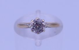 A vintage 9 ct gold and 0.50 carat diamond solitaire ring. Ring size H/I. 1.4 grammes total weight.