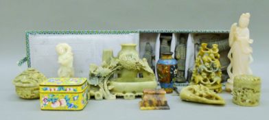 A quantity of various Chinese soapstone carvings, a cloisonne vase etc. The Guanyin 18.5 cm high.