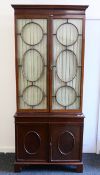 A 19th century mahogany bookcase cabinet. 90 cm wide x 209 cm high.