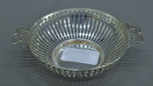 A twin-handled silver bonbon dish. 12.5 cm wide. 51.1 grammes.