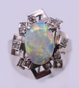An opal dress ring. Ring size N.