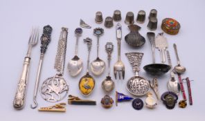 A quantity of small silver and silver-plate items, etc including spoons, thimbles and a 21st Key.