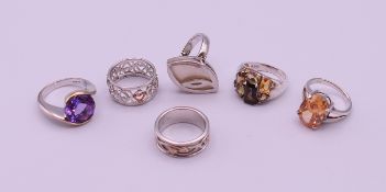 Six silver rings. Various sizes.