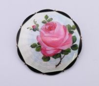 A Norwegian enamel brooch by O F H Jortdahl. 4 cm diameter.
