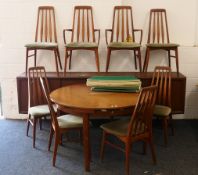 A Danish mid-century dining room suite comprising a sideboard,