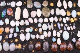 A collection of loose opals. The largest 3.2 cm long.